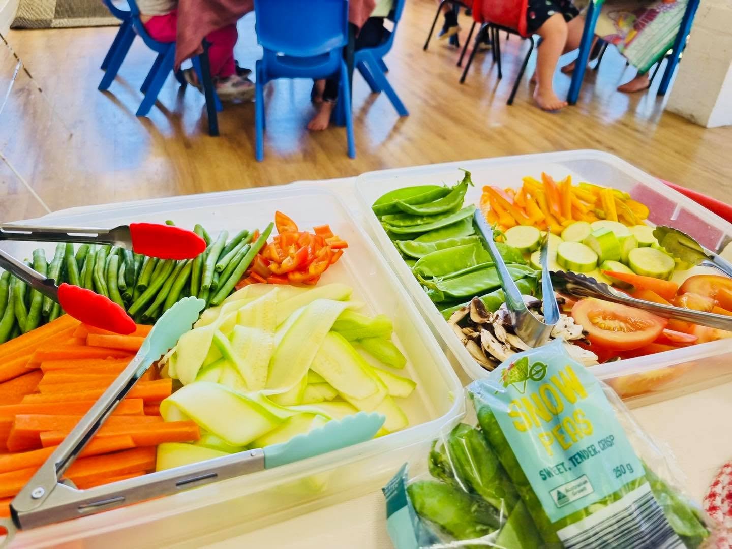 Children learning about vegetables through gardening activities