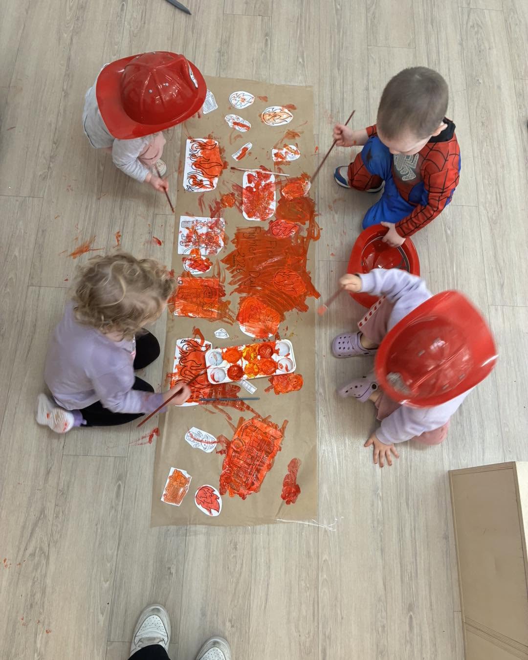 Young children learning and playing together in an early learning environment