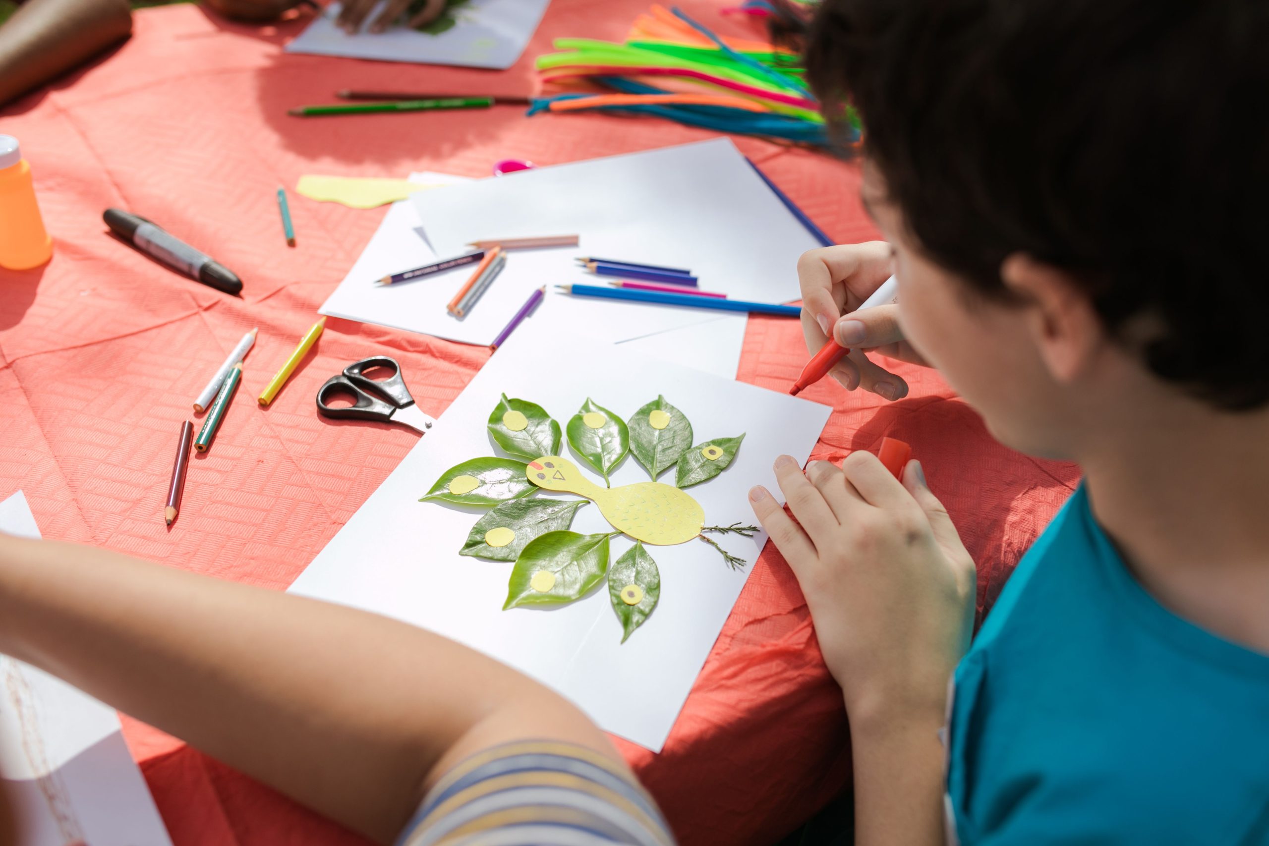 Young children participating in creative learning activities